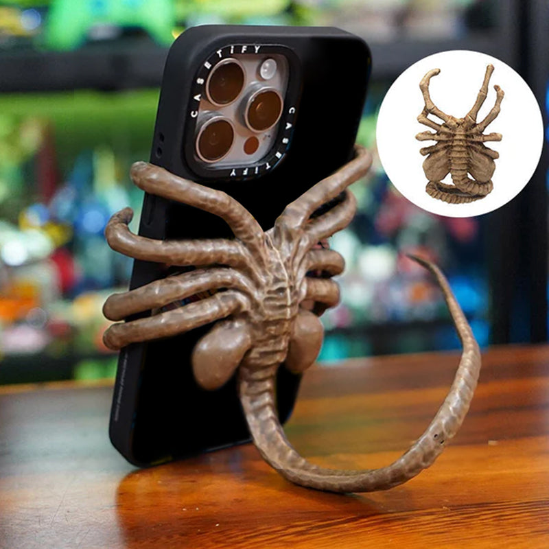Fryktelig Facehugger-telefonholder