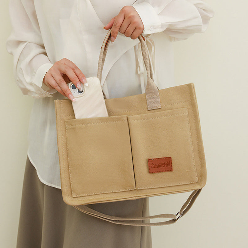 Mote lerret Crossbody Bag